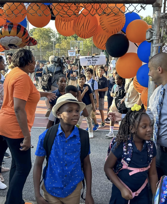 First day of school for NYC: Smiles, sweat, and fears of a possible bus strike