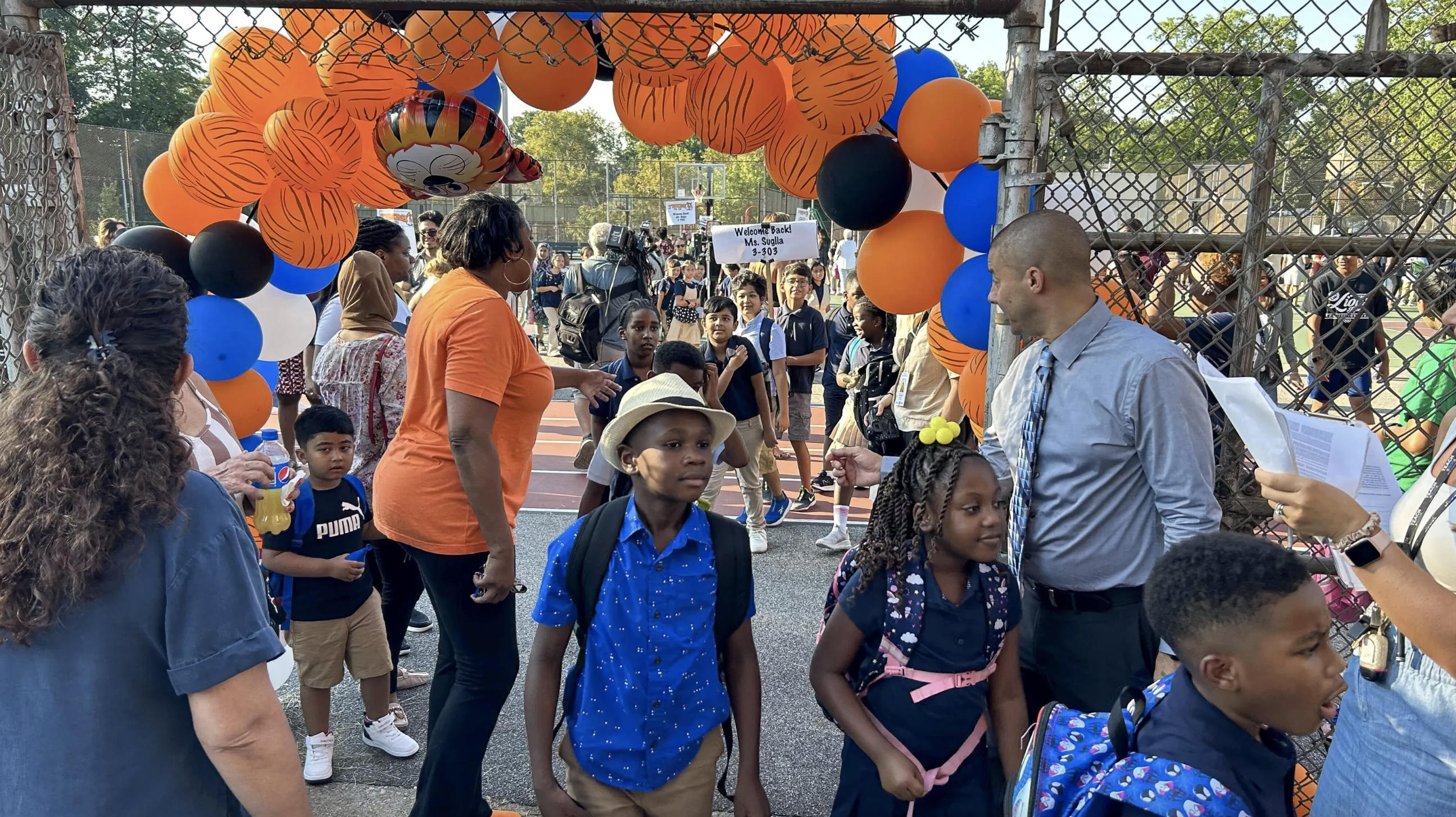 First day of school for NYC: Smiles, sweat, and fears of a possible bus strike