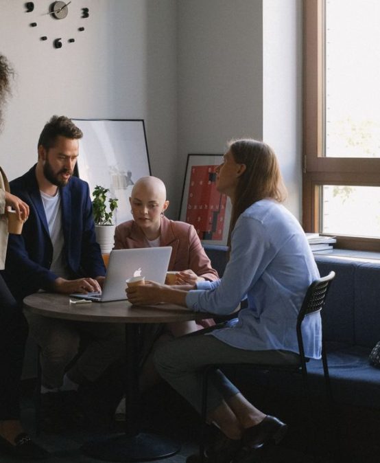 Diverse group of education professionals in a leadership discussion